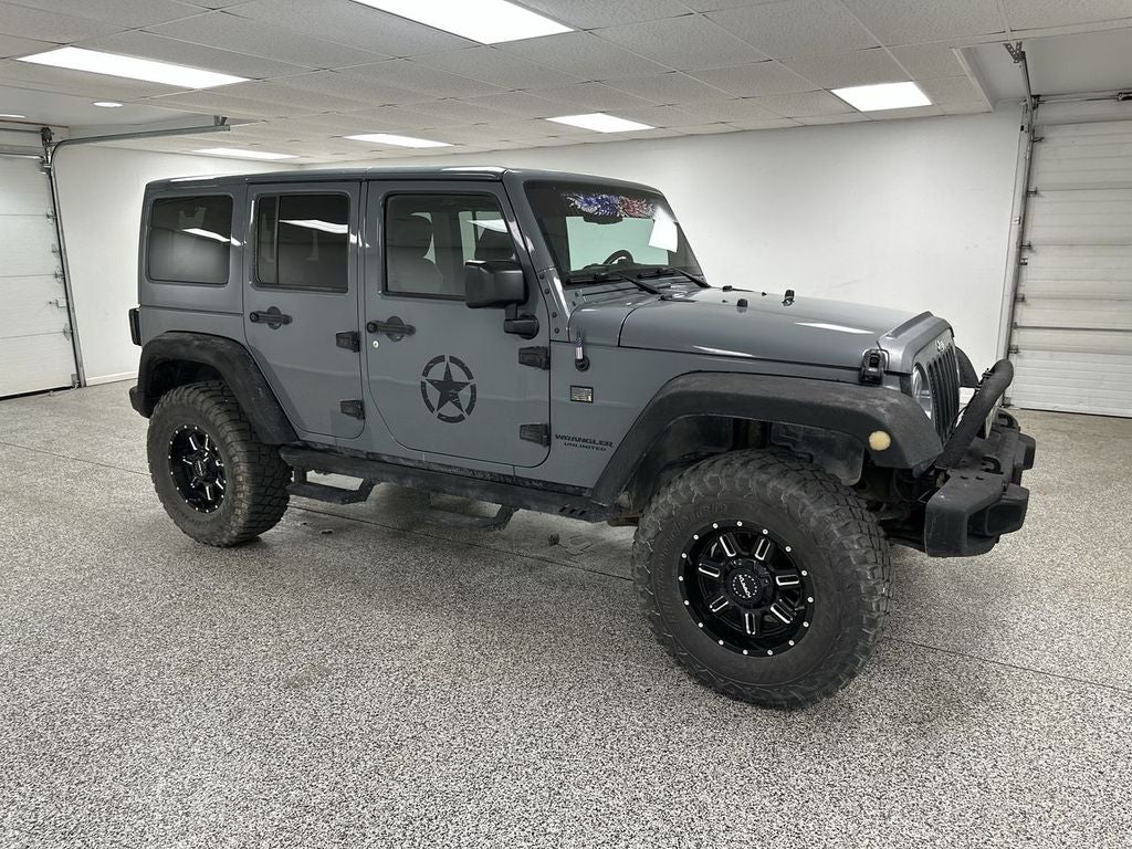 Used 2015 Jeep Wrangler Unlimited Sahara with VIN 1C4BJWEG0FL588472 for sale in Kalkaska, MI